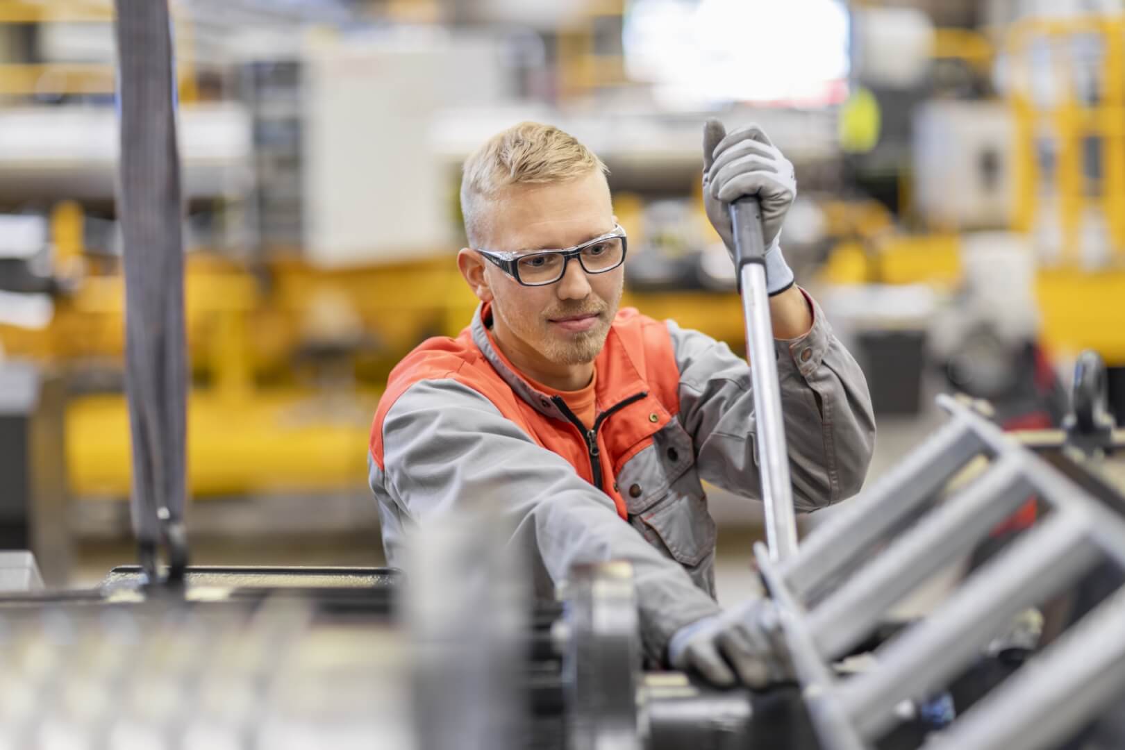 an enginner working with a large tool